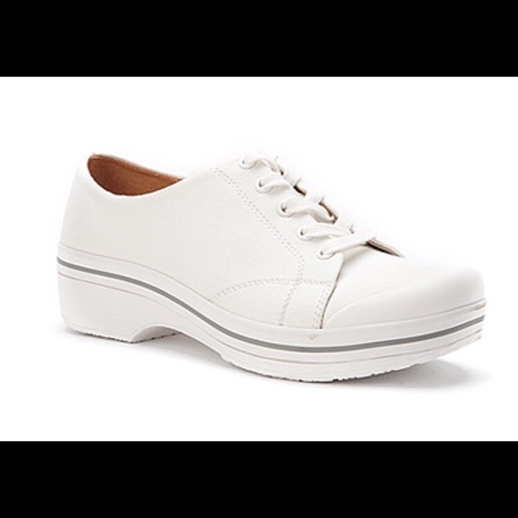 white canvas lace up shoes